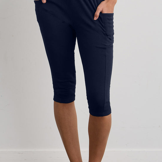 womens organic all-cotton capris pocket leggings - midnight navy blue - fair indigo fair trade ethically made